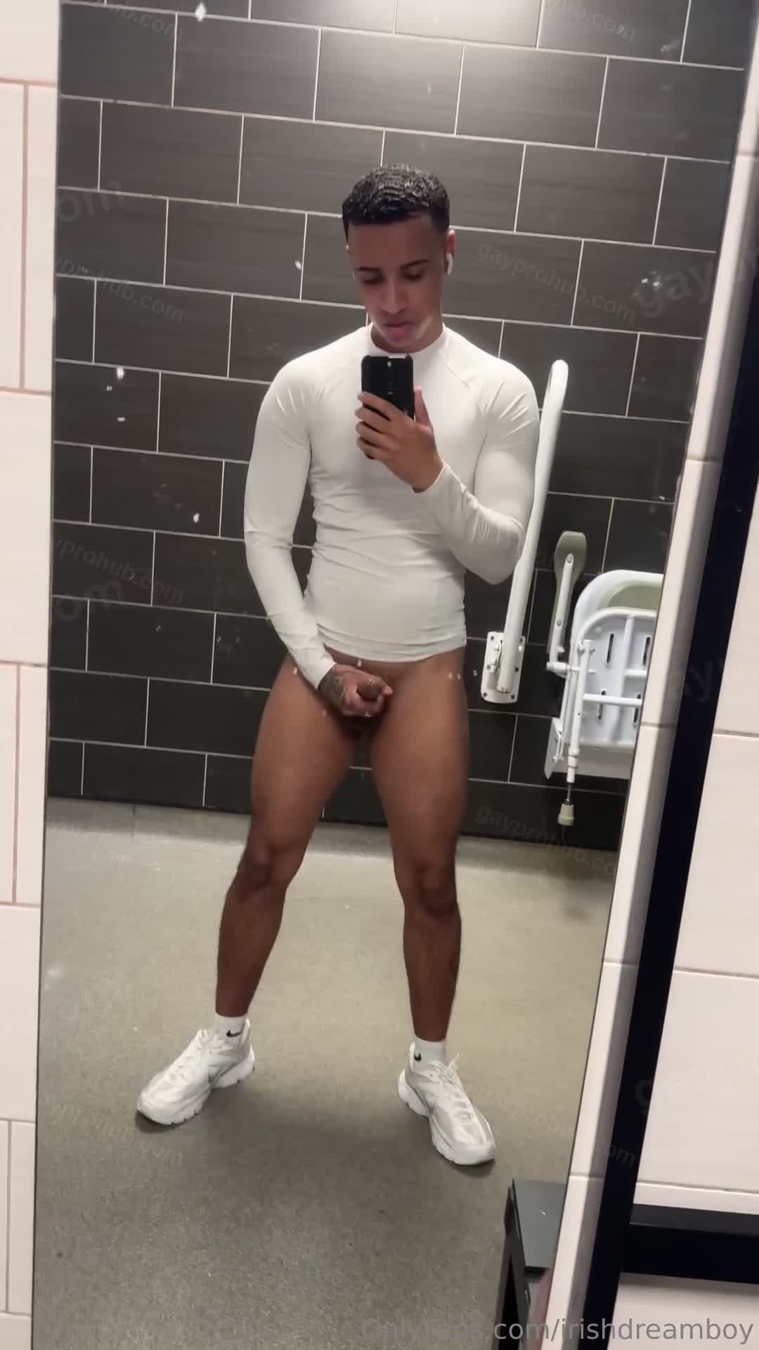 Irish Dreamboy teases his cock in a public bathroom